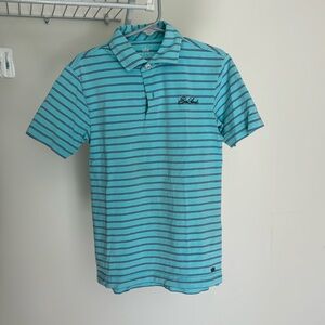 Boys golf shirt. Soft cotton but not performance fabric. Logo is Sea Island.